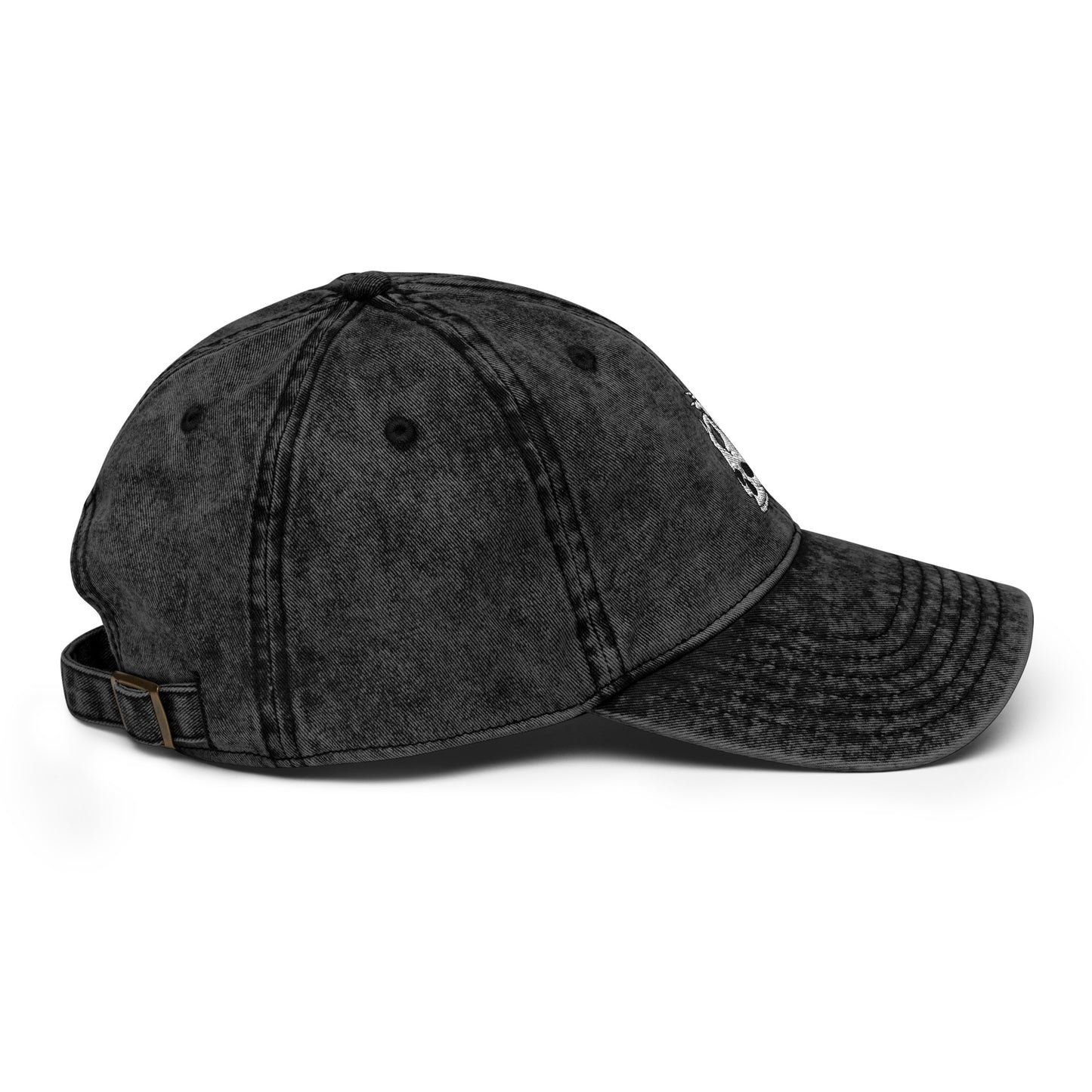 Side view of the Hellbeing skull embroidered vintage black cap